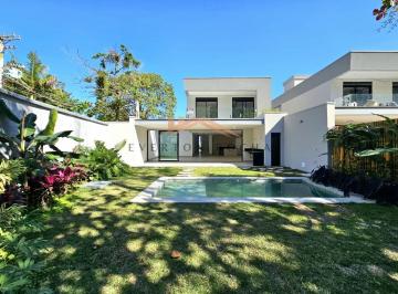 Imagem do Imóvel · Casa de condomínio pé na areia com 4 suítes, jardim e piscina