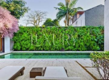 1 · Casa com design contemporâneo com 1027 m²,  8 suítes à venda no bairro Jardim Paulistano.