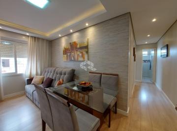 321814_i79fN7_321814643d71c824fd4.jpg · Apartamento de 2 dormitórios, living 2 ambientes, banheiro social, cozinha e área de serviço separad