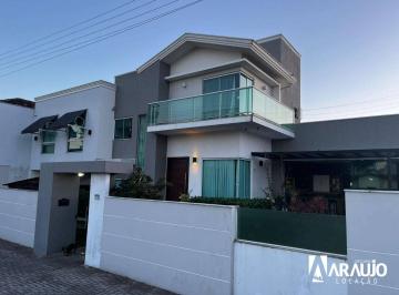 486d6058fa253c1123da576e0e936c640b411506 · Casa com 3 dormitórios para alugar - Centro - Navegantes