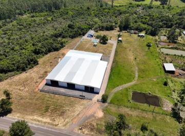Foto 01 · Pavilhão industrial em uma área de terreno de 3ha, topografia plana e com localização estratégica ju