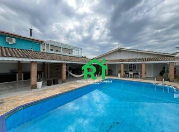 cd5980de629c955a0f44a2596cc453b204124bb1 · Casa à beira mar com 3 suítes, 3 vagas, edícula e lazer à venda em Enseada, Guarujá
