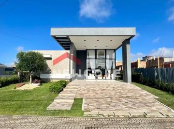 Casa · 205m² · 4 Quartos · 2 Vagas · Casa de condomínio em  Rua Butia - Centro - Tramandaí/RS