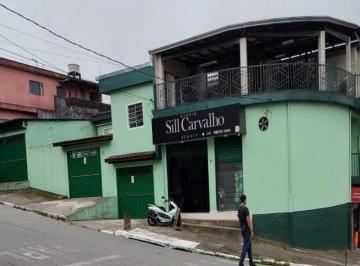 Photo 1 · Prédio Comercial com Casas, Salões e Construção em Andamento – Ideal para Renda
