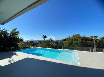 703970_izU439o14RzuPZaLR_703970687ea0c56c9c2.jpg · CASA DE ALTO PADRÃO COM 5 SUÍTES ESPAÇO GOURMET E PISCINAS - PRAIA BRAVA FLORIANÓPOLIS