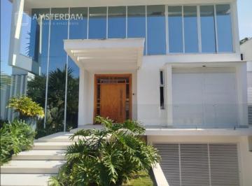 Foto 27 · Casa à venda no M19 na Riviera, com 7 suítes, decorada, com 666,40 m² de área construída.