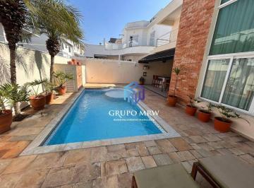 55885dcbb9c511f3a1b08d0de08026accba02836 · Casa com 4 dormitórios, 290 m² - venda por R$ 2.350.000,00 ou aluguel por R$ 12.950,00/mês - Condomí
