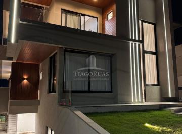 Foto 01 · LUXO E PRIVACIDADE EM ALPHAVILLE 2: Casa de Alto Padrão com 4 Suítes, Espaço Gourmet e Piscina por R