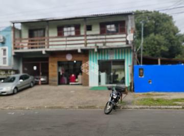 704429_i63OM8cL3U_70442968829d765de5c.jpg · Excelente terreno com lojas, bairro: Marechal Rondon - Canoas