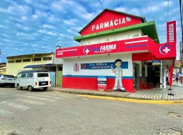 Fachada lateral · Imóvel comercial à venda na Av. principal no Centro de Navegantes, Ótima opção p