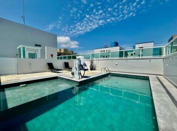 Piscina · TORRE BRANCA PRAIA – SEU NOVO LAR A UMA QUADRA DO MAR
