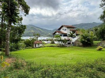 Casa · 242m² · 6 Quartos · 4 Vagas · 2 lotes com uma Casa à venda no condomínio Portogalo - Angra dos Reis.