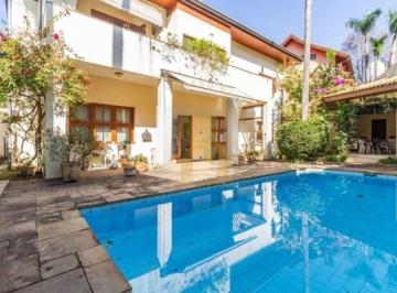 Casa · 390m² · 4 Quartos · 5 Vagas · Casa mobiliada á venda de 390 m², com 04 suítes e 05 vagas no Alto de Pinheiros.