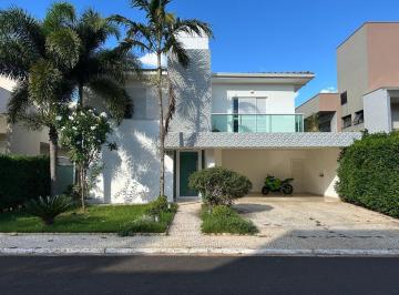 Foto 01 · Imóvel de luxo com 4 suítes e 4 vagas de garagem na cidade de cidade]
