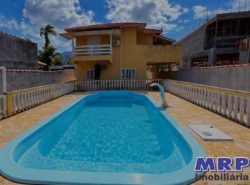 Foto 36 · Casa com piscina à venda em Ubatuba. A100 metros da Praia. 4 quartos.