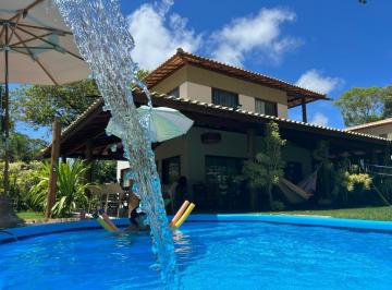 Casa de 4 quartos, Mata de São João · Casa dentro de Praia do Forte 4 suites piscina privativa em condominio 500m² etc