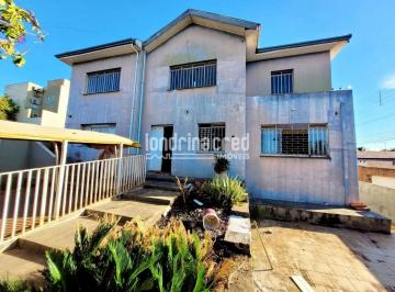31747745568960.jpg · Ampla casa na área central de Ibiporã com 315m², 7 dormitórios, 3 banheiros, 4 vagas e 371m² de terr