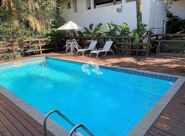 525856_iUB95c9tJx423t163a_52585667882c5b3b472.jpg · APARTAMENTO 2 SUÍTES - 142m² - 2 VAGAS - LAGOA DA CONCEIÇÃO
