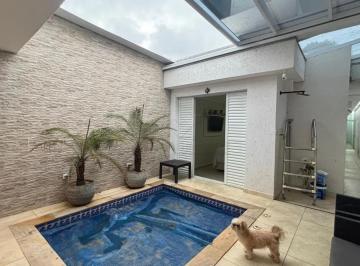 Casa · 200m² · 2 Quartos · 2 Vagas · Casa com piscina à venda com 200m2 e 02 dormitórios com 2 suítes e 02 vagas no Jardim Stella, Santo 