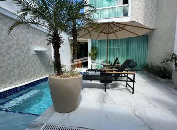 Casa · 100m² · 3 Quartos · 2 Vagas · Sua casa de praia em alto estilo espera por você!