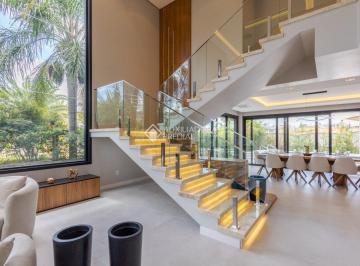 Casa · 351m² · 4 Quartos · 4 Vagas · Casa em condomínio a venda mobiliada 4 suítes, pátio com piscina no Marechal Rondon em Canoas.