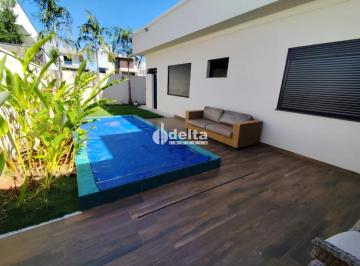 Casa · 454m² · 4 Quartos · 2 Vagas · Casa mobiliada em condomínio disponível para locação no bairro Nova Uberlândia em Uberlândia-MG