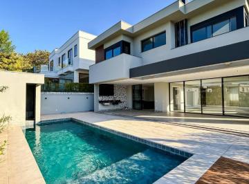 Casa · 557m² · 6 Quartos · 7 Vagas · Residência Imponente com 6 Suítes, Elevador, 7 Vagas no Tamboré - SP.