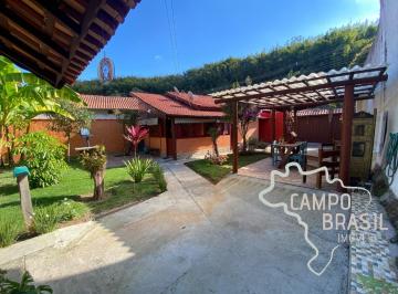 Foto 03 · Chácara urbana com estilo rústico, duas suítes e paisagismo! 450m² de terreno!