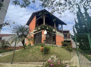Casa · 420m² · 4 Quartos · 2 Vagas · Casa à venda no bairro Jardim América - Caxias do Sul/RS