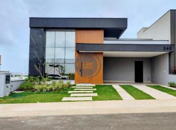 Fachada moderna · Casa de luxo em condomínio: 3 quartos, 3 suítes, 3 salas, 5 banheiros, 4 vagas, 188m² no Jardim Resi