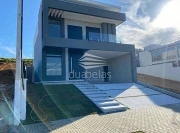 Casa · 248m² · 4 Quartos · 4 Vagas · Lindo sobrado no condomínio Terras Alpha.