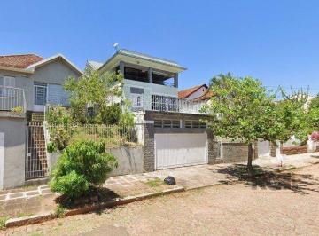 Casa · 168m² · 4 Quartos · 2 Vagas · Casa com 167m², 4 dormitórios, 2 suítes, 2 vagas no bairro Santa Tereza