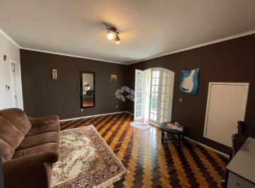 613644_ir53l9VG79p4Fb2_61364466ae3d7c58caa.jpg · Casa com Amplo Terreno a 10 min do Centro de Florianópolis: Potencial Construtivo e Vista Panorâmica