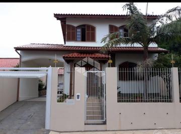 702612_i5w158R5RQPwJ9_702612687013ac84007.jpg · Casa com Piscina e Edícula no Jardim Atlântico - Florianópolis 4 Dormitórios | 1 Suíte com Banheira 
