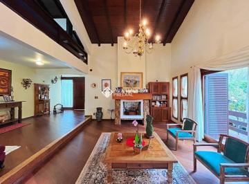 738257_i1454775z8bl387V_73825768bae09d63cbd.jpg · Casa com 3 suítes, lareira, piscina e churrasqueira à venda, condomínio Jardim do Sol