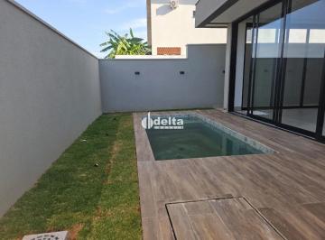 Casa · 275m² · 3 Quartos · 2 Vagas · Casa com 3 quartos sendo 2 suíte, disponível para venda em Uberlândia-MG