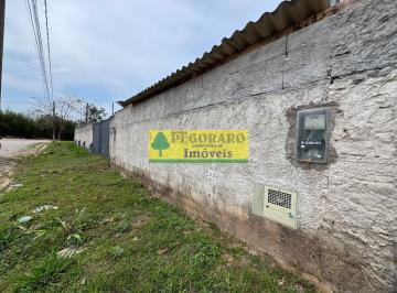 Foto 01 · Terreno de Esquina no Getuba - 1.118 m²: Plano, Murado, Pavimentado, Água e Luz Instalados