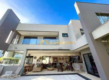 300472bde43588f81301ee912cef9e062a2a04e1 · Casa com 4 dormitórios para alugar, 475 m² por R$ 32.012,00/mês - Condomínio Reserva do Paratehy - S