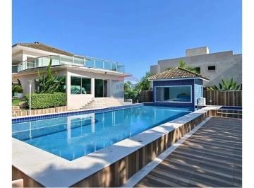 Casa · 560m² · 5 Quartos · 6 Vagas · "Seu Oásis de Elegância em Peruíbe - Conheça Já!"