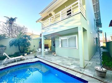 Casa · 259m² · 4 Quartos · 3 Vagas · "Luxuoso Sobrado em Peruíbe: Conforto e Modernidade"