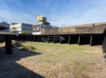 Foto 01 · Terreno e galpão com 1768m² a venda na Vila Mathias em ótima localização em Santos / SP