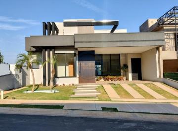 Fachada moderna · Casa de luxo em condomínio à venda em Indaiatuba-SP, Jardim Villa Sapezal: 3 quartos, 3 suítes, 2 sa