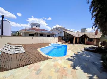Casa · 290m² · 4 Quartos · 4 Vagas · Casa residencial semimobiliada com vista para o mar, com 4 dormitórios, sendo 2 suítes, 4 vagas de g