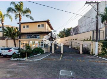 ile frente · Casa/sobrado com 2 dormitorios , 2 vagas em Condominio fehcado.