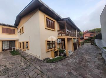 Casa · 99m² · 3 Quartos · 2 Vagas · Sobrado com 3 dormitórios no Bairro Jardim América, Caxias do Sul