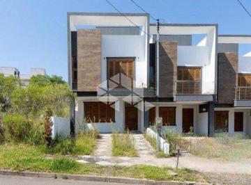 01 · Sobrado em estilo contemporâneo no bairro Guarujá.