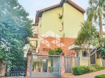 Casa · 195m² · 3 Quartos · 2 Vagas · Casa Condômino 3 dormitórios 195 m2 area priv 2 garagens vista Guaiba Casa Carnes Moacir