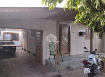 Casa · 80m² · 3 Quartos · 3 Vagas · Terreno com 2 casas de madeira no bairro Moinhos de Vento em Canoas
