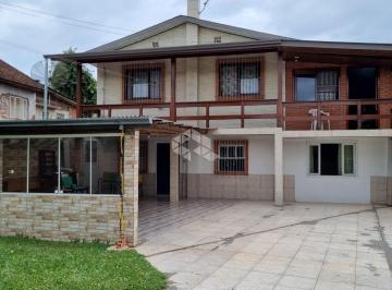Casa · 198m² · 6 Quartos · 3 Vagas · Casa com 02 moradias à venda no bairro Nª Sra. da Saúde, Caxias do Sul