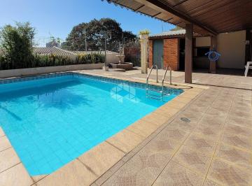 Casa · 318m² · 4 Quartos · 4 Vagas · Casa à venda com 4 dormitórios, 4 vagas de garagem e piscina no Bairro Três Figueiras, Porto Alegre/